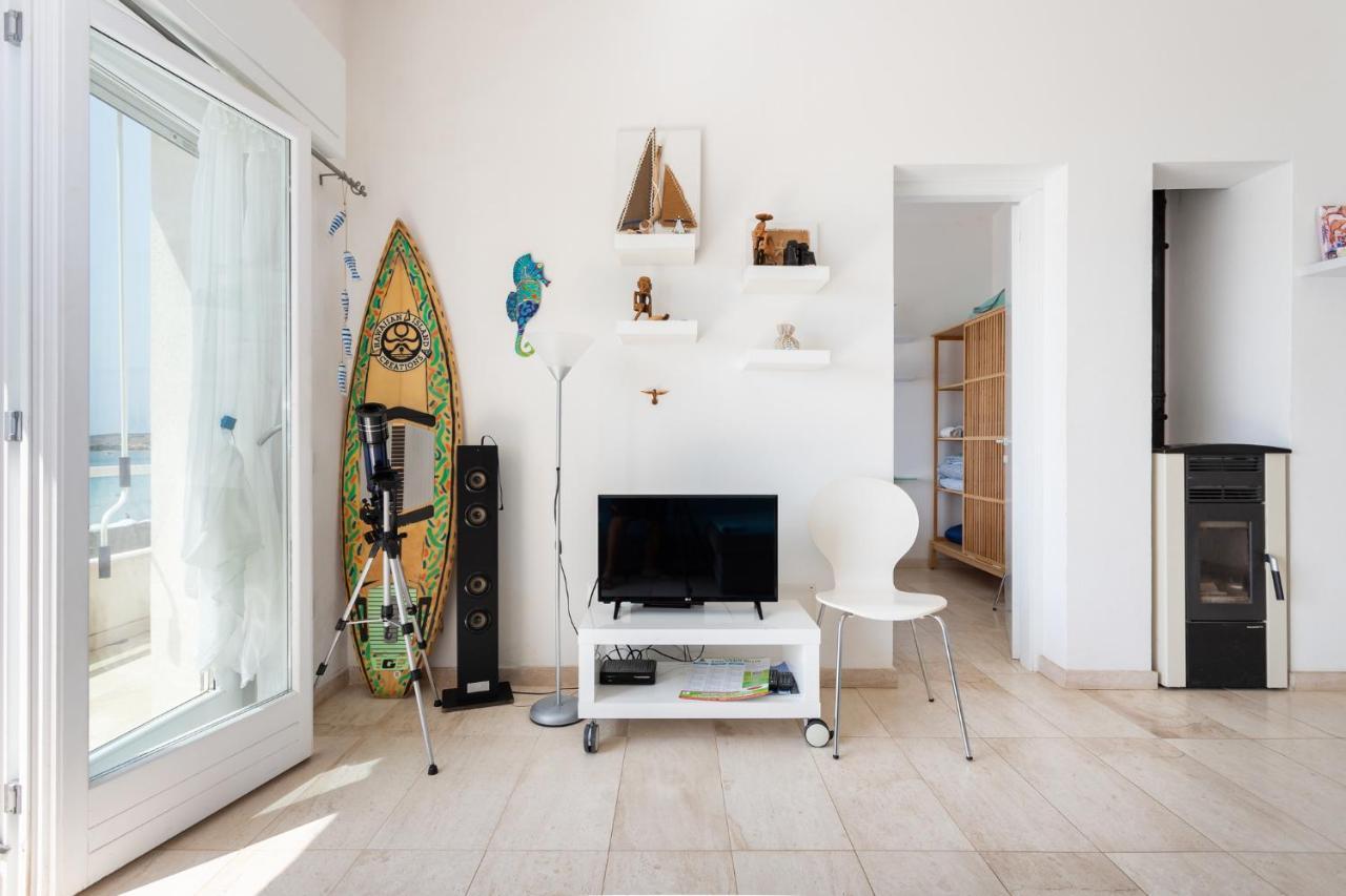 Appartamento Fronte Mare - Waterfront Apartment Putzu Idu Exterior photo
